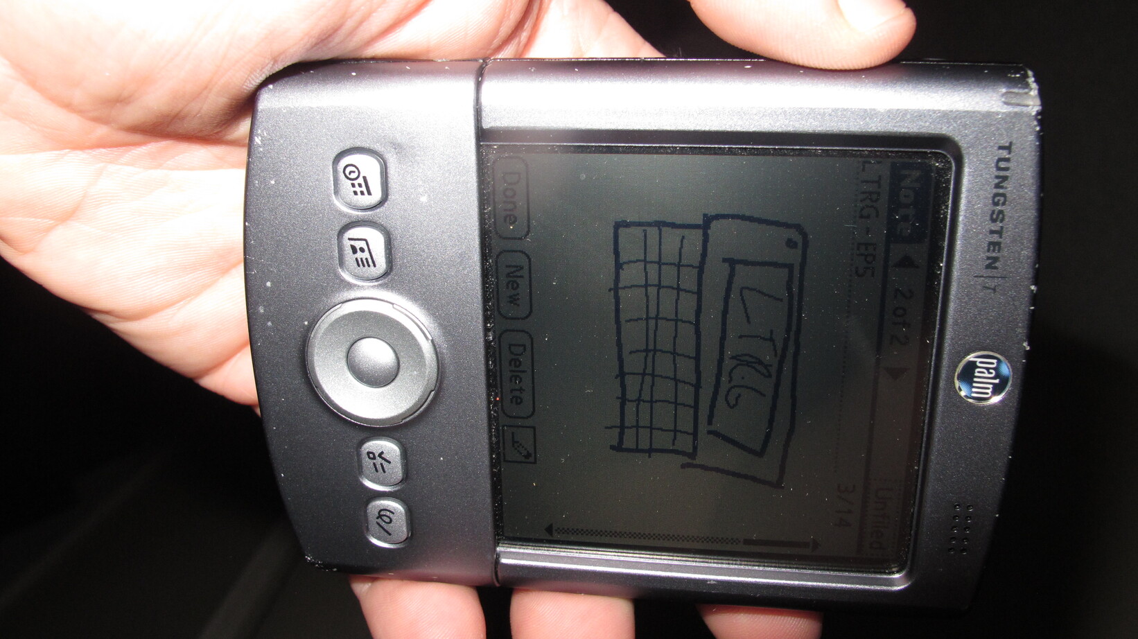 A Palm Tungsten T displaying a crude LTRG Logo.